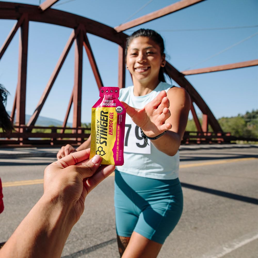 Runner grabing energy gel
